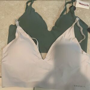 Two new sport bras with tags size XL